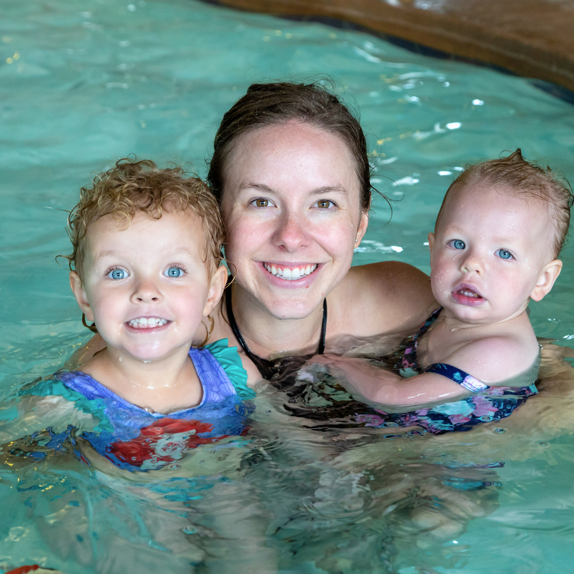 Trails Aquatics | Parent with two kids in the pool