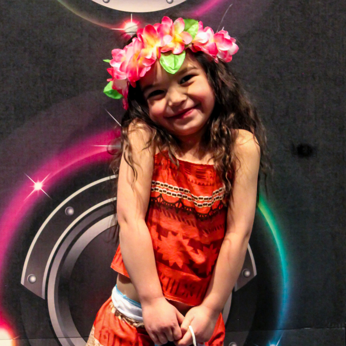 Performing Arts Page | Young girl in Moana costume at a dance class recital