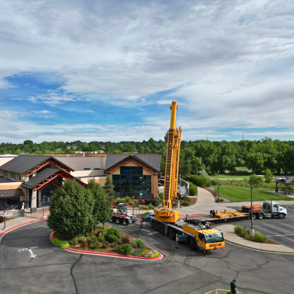 HVAC Installation Blog | Large crane in the Trails Rec Center's parking lot as crews finish up the installation of a new HVAC systerm