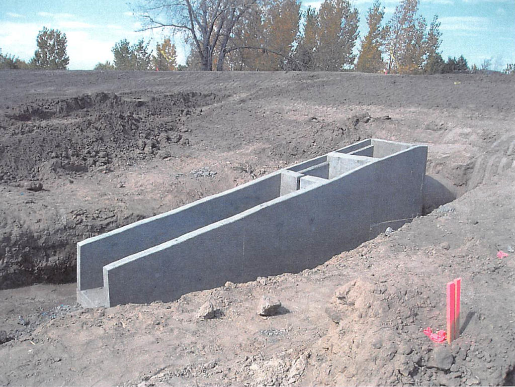 October 2003 Construction Pictures: detention pond outfall structure being built