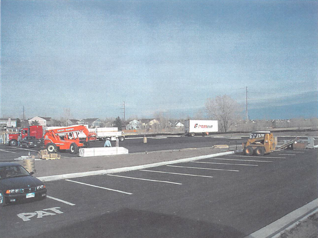 November 2003 Construction Pictures: first layer of parking lot asphalt is complete