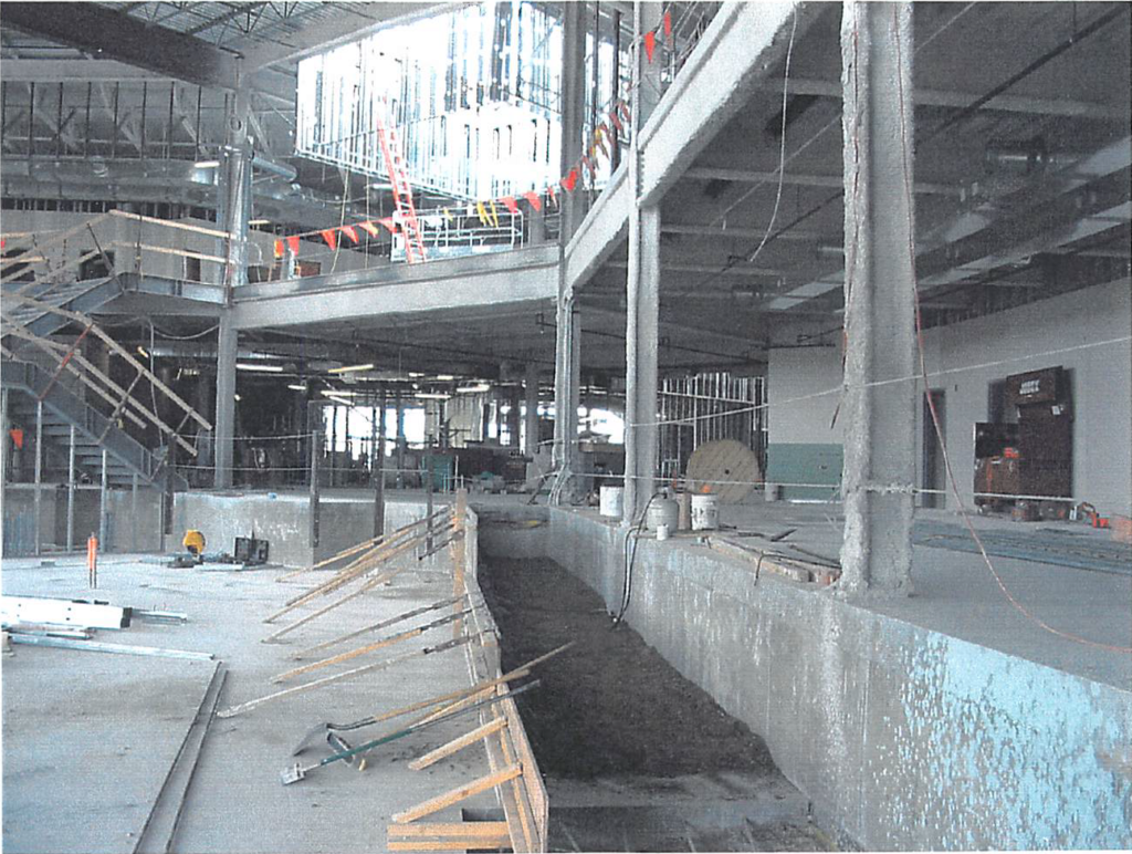 March 2004 Ramp to lower fitness floor in progress. Skylight framing in progress