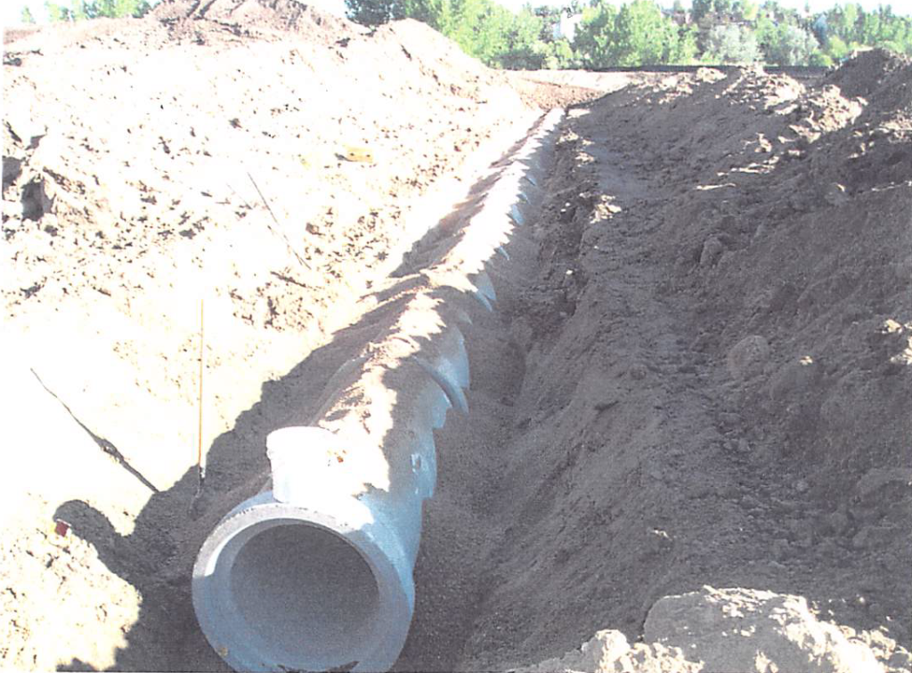 August 2003 Construction Pictures: installing the storm sewer drain for the trails recreation center