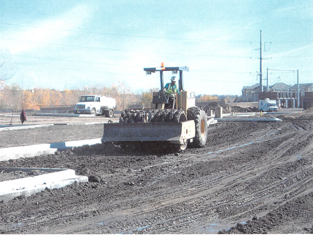 October 2003 Construction Pictures: subgrade of parking lot being prepared for the first layer of asphalt