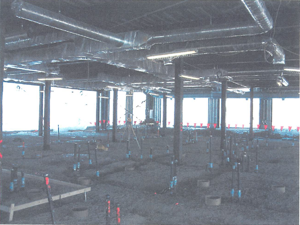 January 2004 Underground plumbing and overhead ductwork is in progress at locker room area