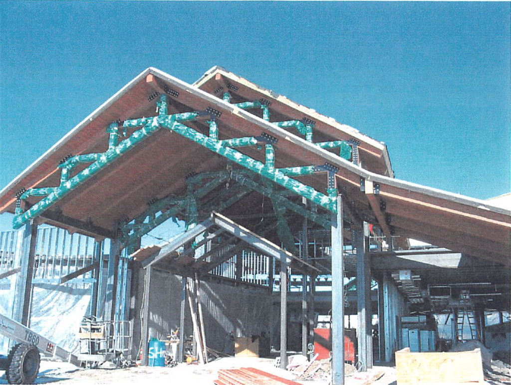 January 2004 Wood trusses and wood roof decking in progress at main entrance