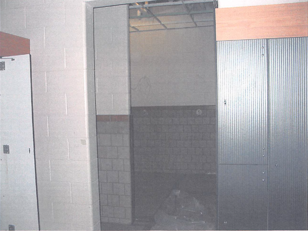 June 2004 | Ceramic tile and locker installation in progress