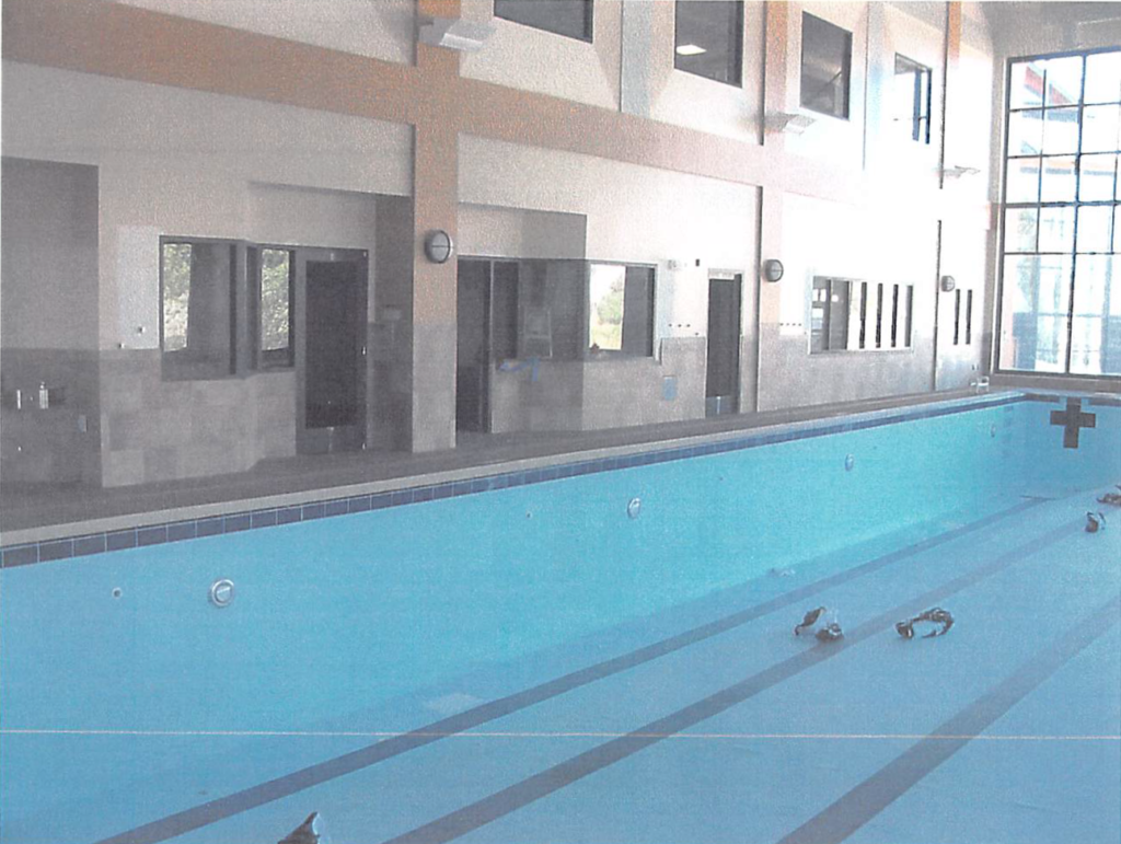 August 2004 | Lap pool membrane nearly complete. Deck concrete topping has been poured around pool. Sauna and Steam Room in progress