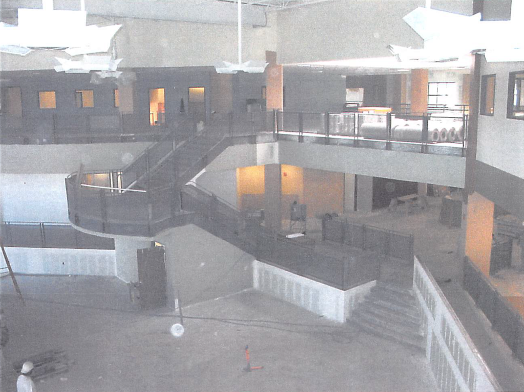 July 2004 | Metal railings in progress at main stair and fitness area