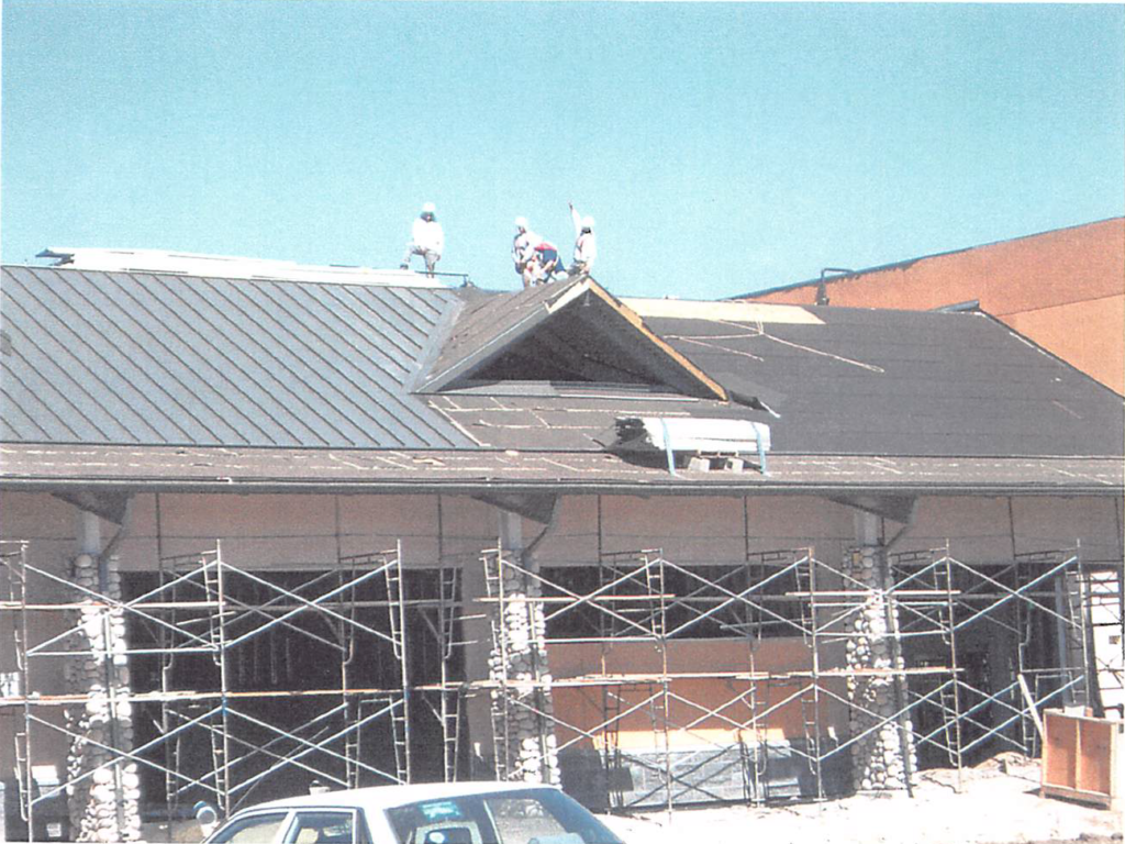 May 2004 | Metal roofing work continuing