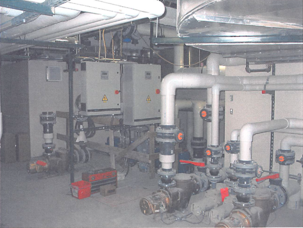 June 2004 | Pool mechanical room piping and pump installation in progress