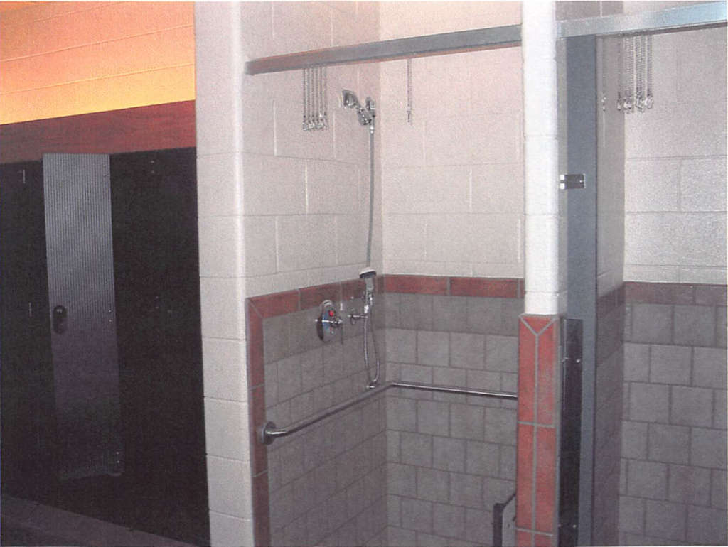 September 2004 | Shower accessory installation in progress